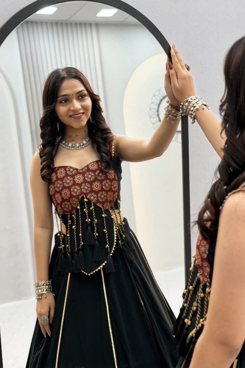 Fully stitched Ajrak Lehenga Choli with black skirt, gold detailing and traditional print