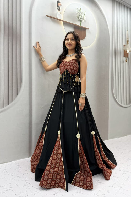 Navratri Ajrak Chaniya Choli featuring a 6 meter black lehenga flair and printed panels