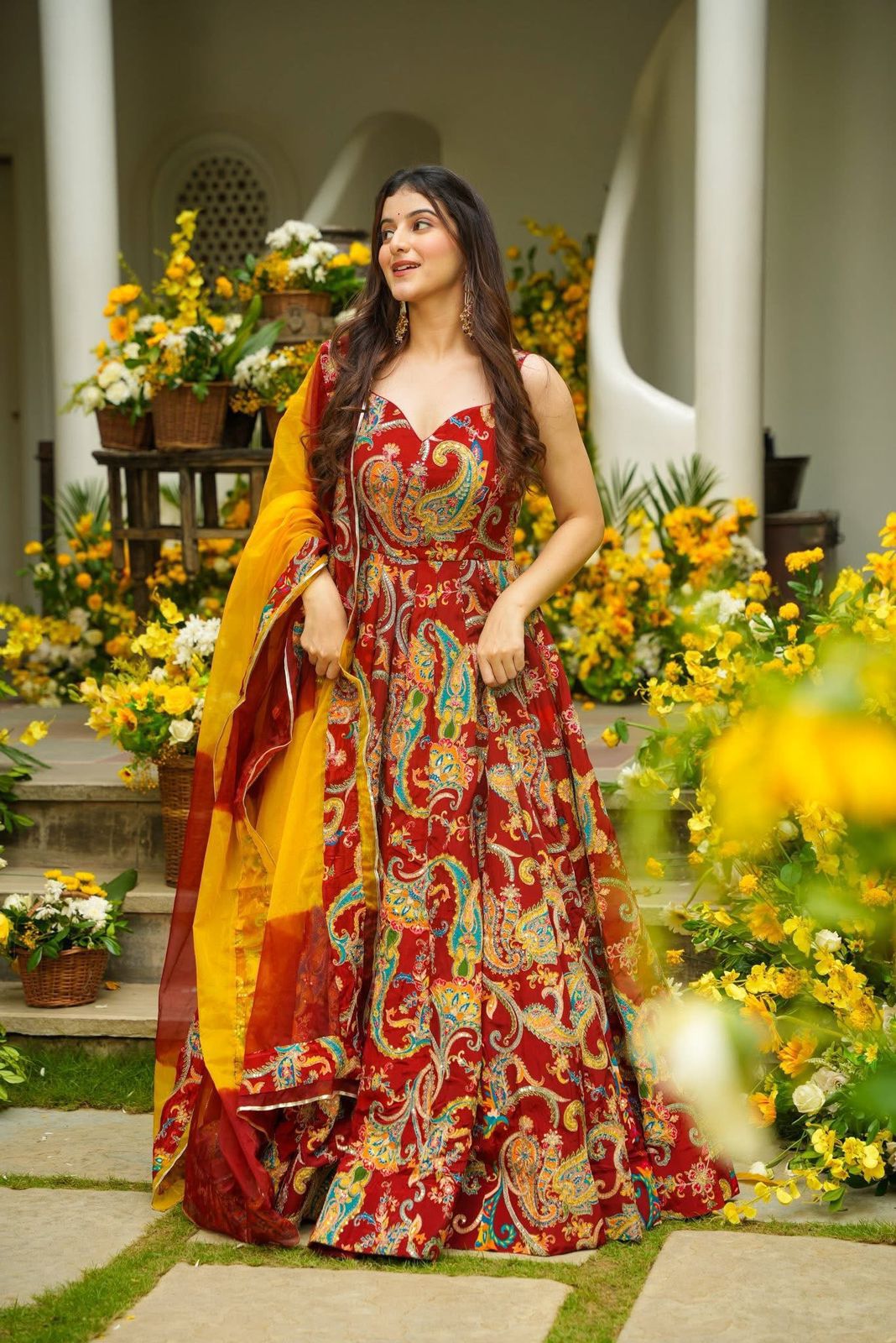 Full-length printed Anarkali gown styled with a yellow Jimmy organza dupatta