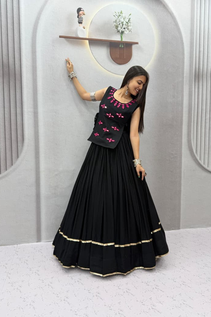 Black Navratri Chaniya Choli with pink motifs, 6-meter Rion cotton lehenga and gold border