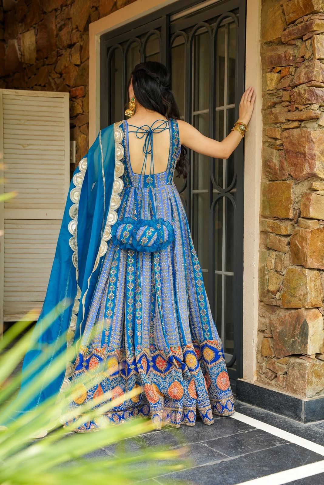 Back view of blue Jimmy Organza Silk Anarkali Gown showing tie-back detail