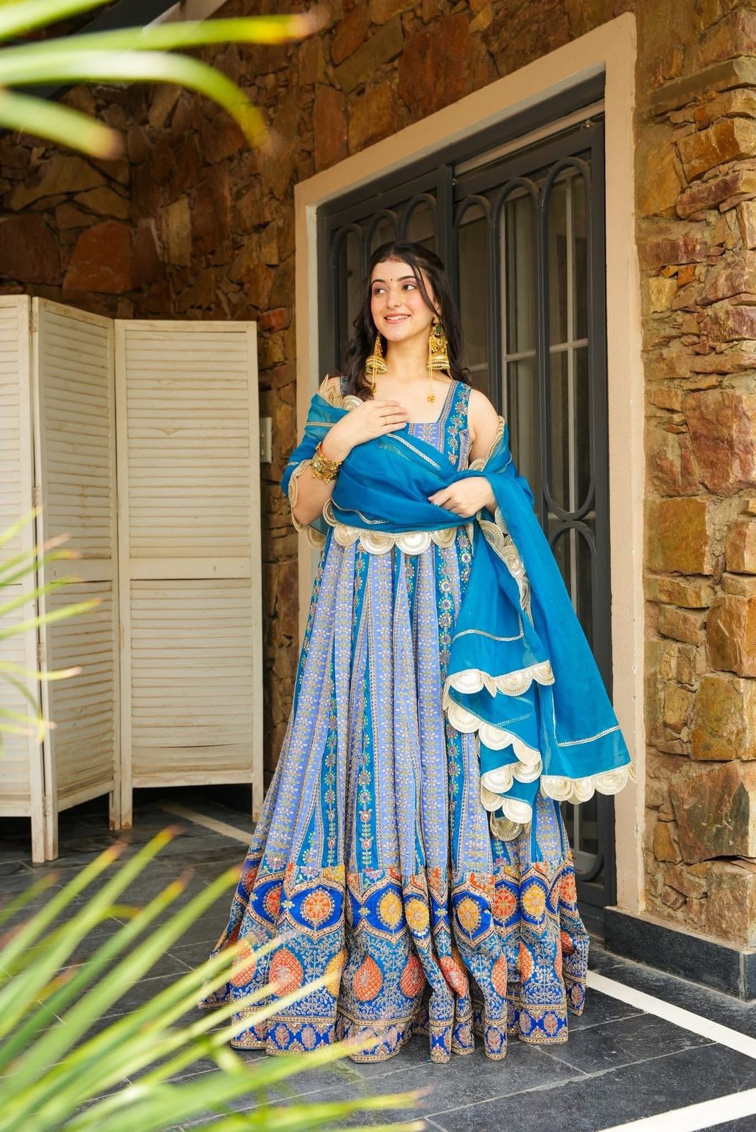 Blue Anarkali Gown styled with Georgette dupatta and decorative lace