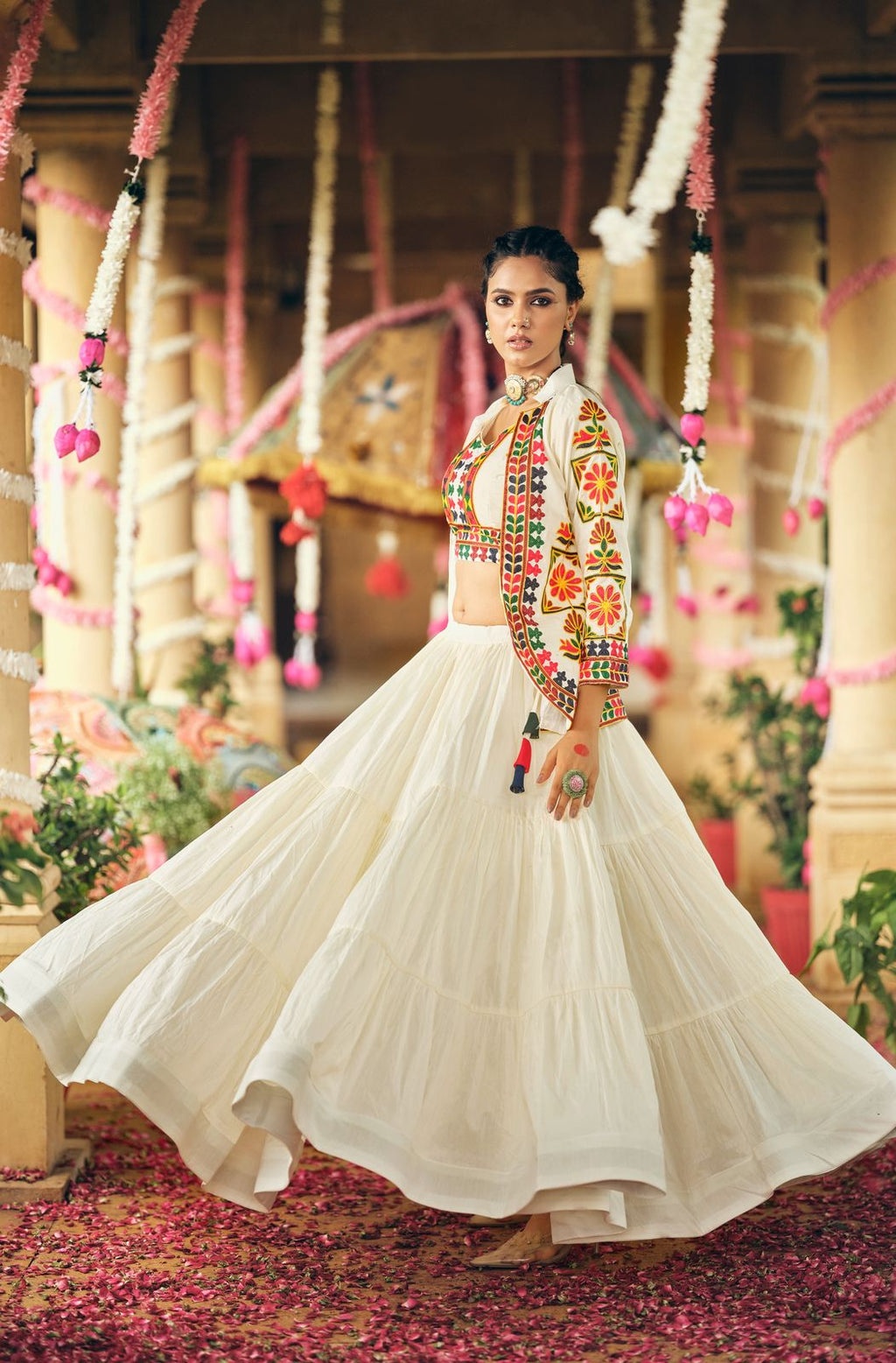 Full-length cotton lehenga choli set showing the three-layer ruffle skirt and embroidered open koti