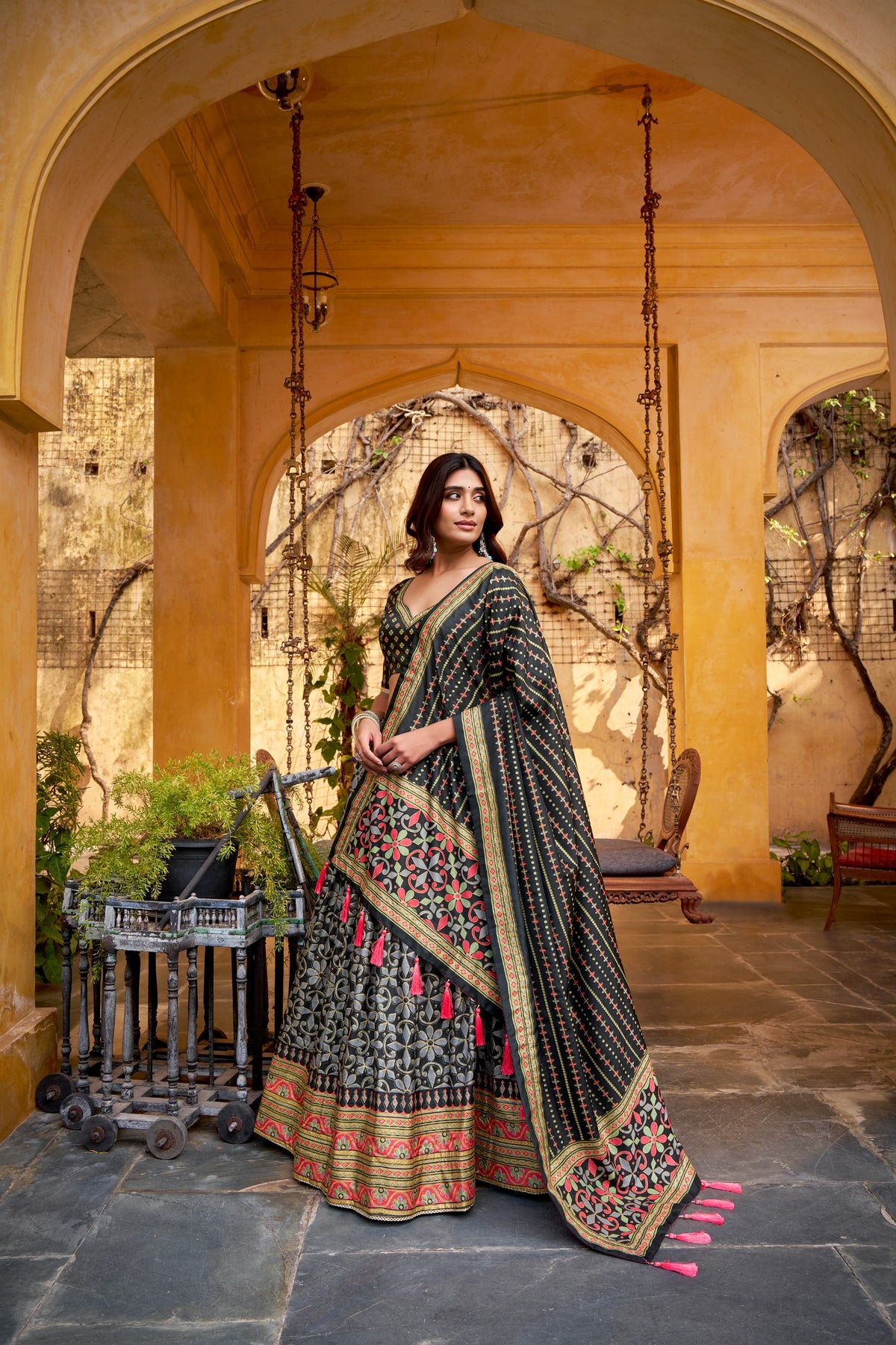 Dark Tasar Silk Lehenga Choli with sparkle work, patterned skirt and tassel-finished dupatta