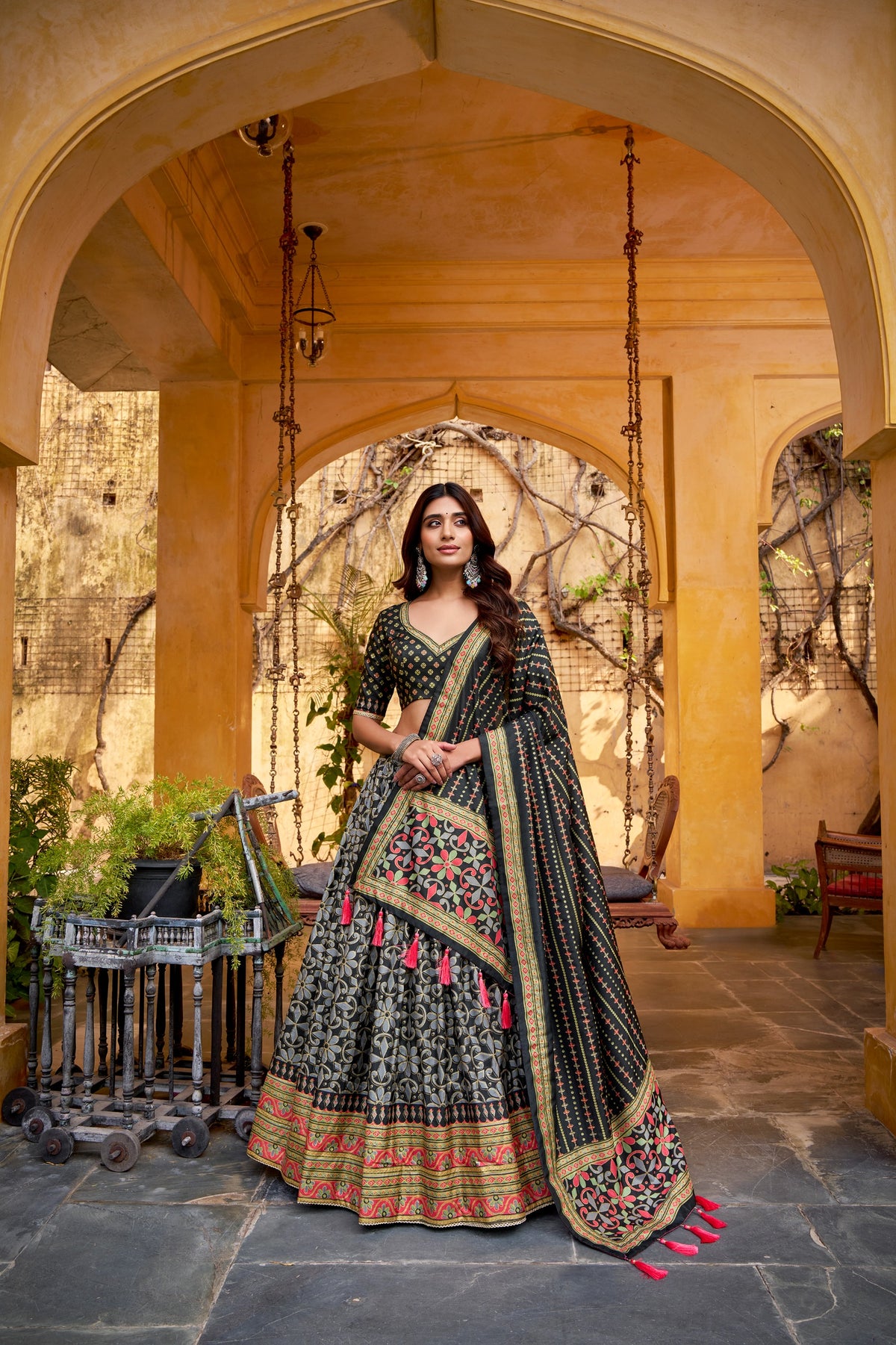 Dark Tasar Silk Lehenga full look with flared skirt, coordinated dupatta and decorative lace borders
