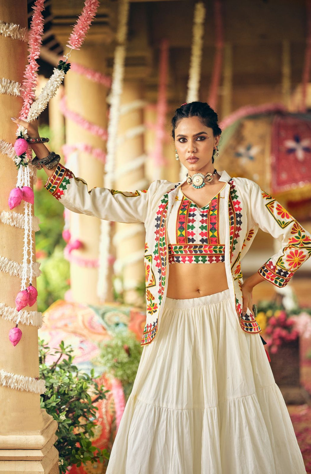 Front view of Indian cotton lehenga choli set with multicolor embroidery and matching embroidered koti