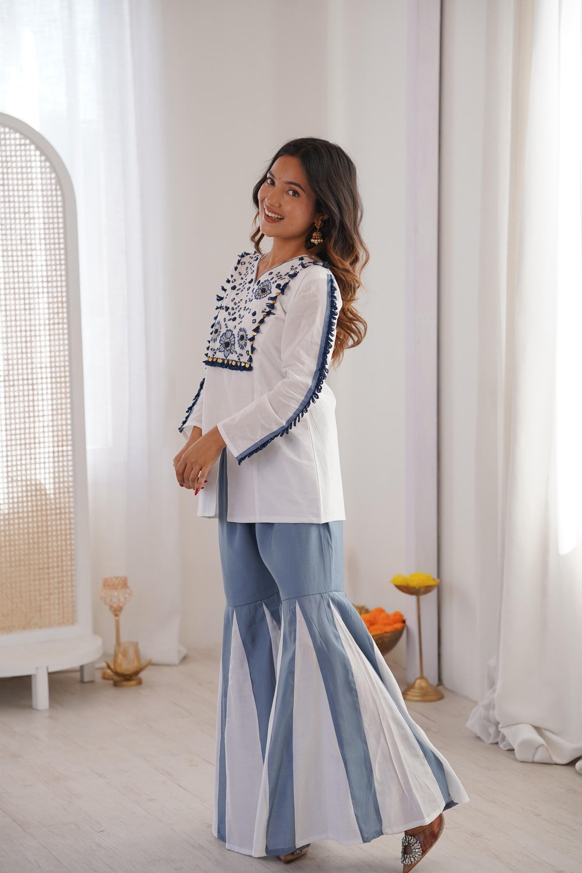 Front view of embroidered Roman Silk Kurta Palazzo Set with real mirror work