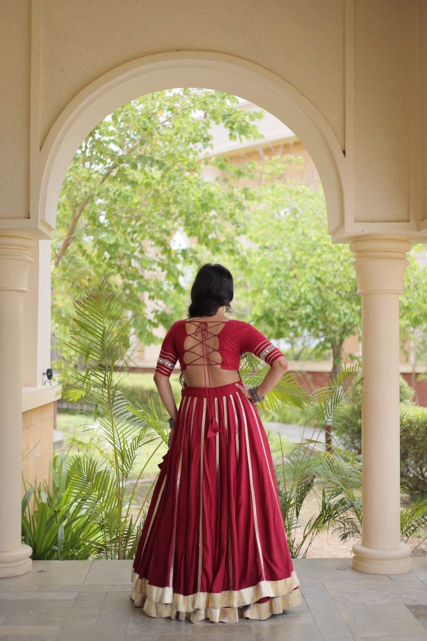 Close-up of Gamthi embroidery, mirror work and gota patti details on the lehenga choli
