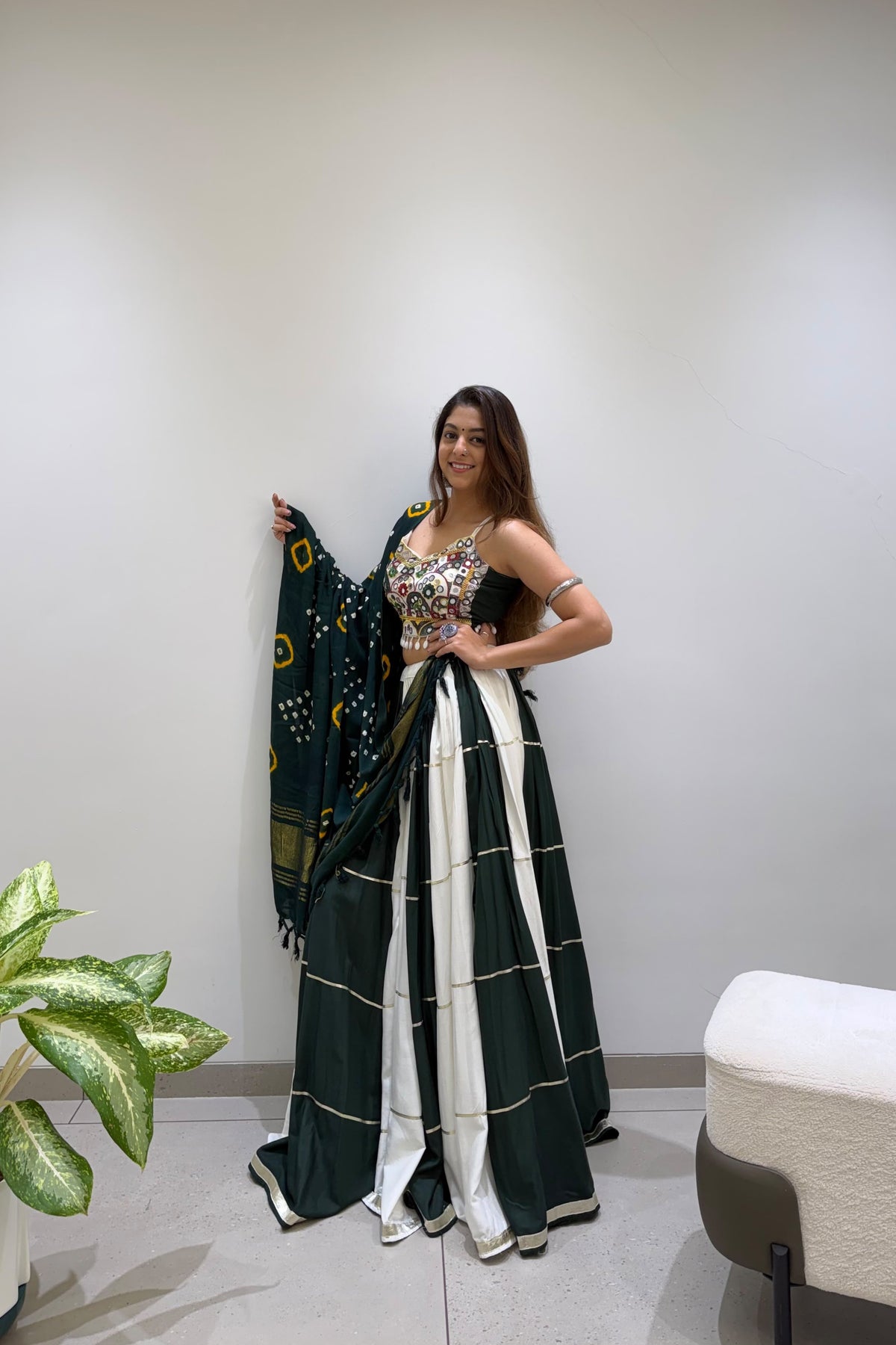Green and ivory Navratri lehenga choli styled on a model for Garba celebrations