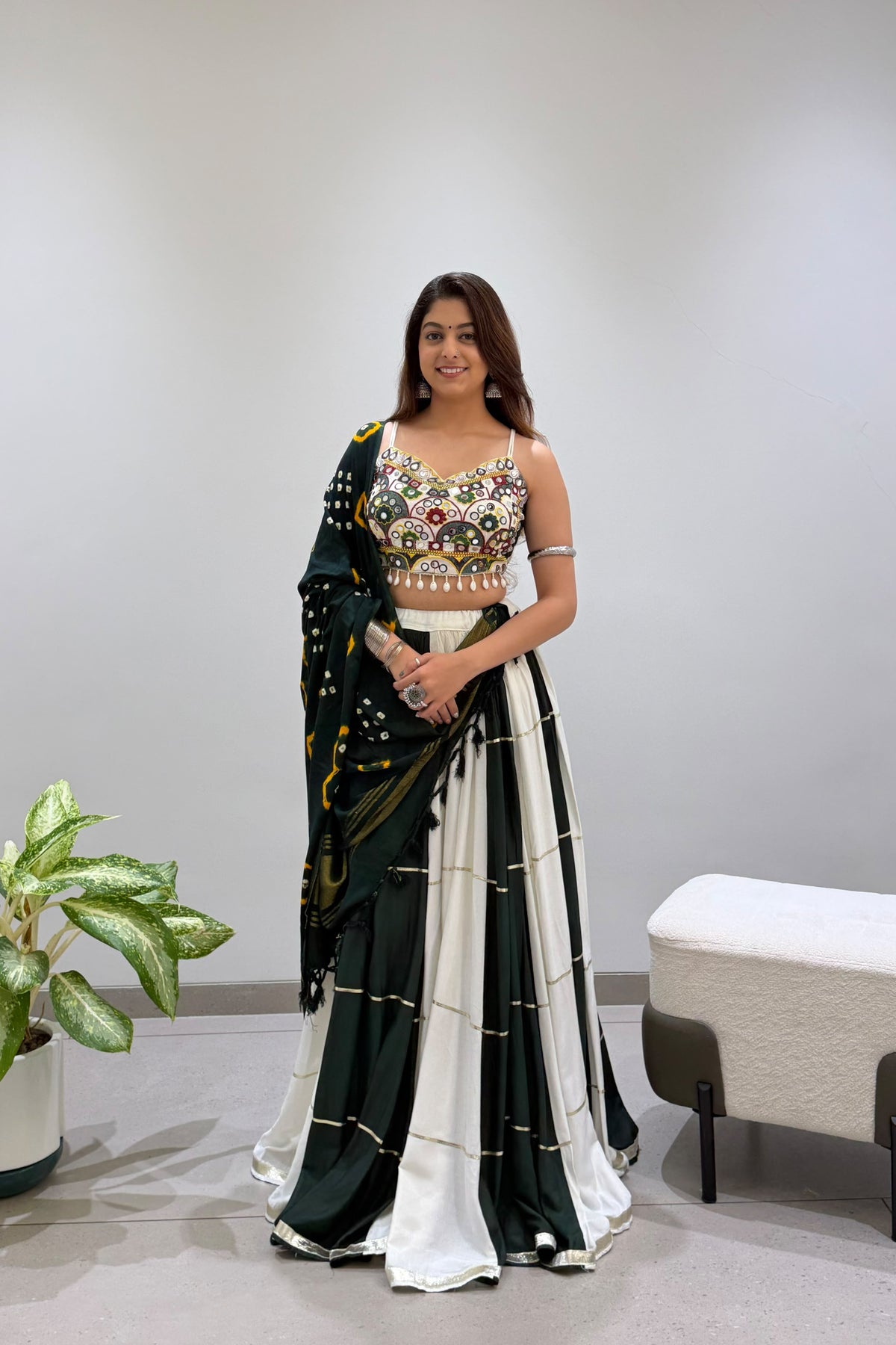 Full look of green and ivory Navratri lehenga choli with Bandhni dupatta
