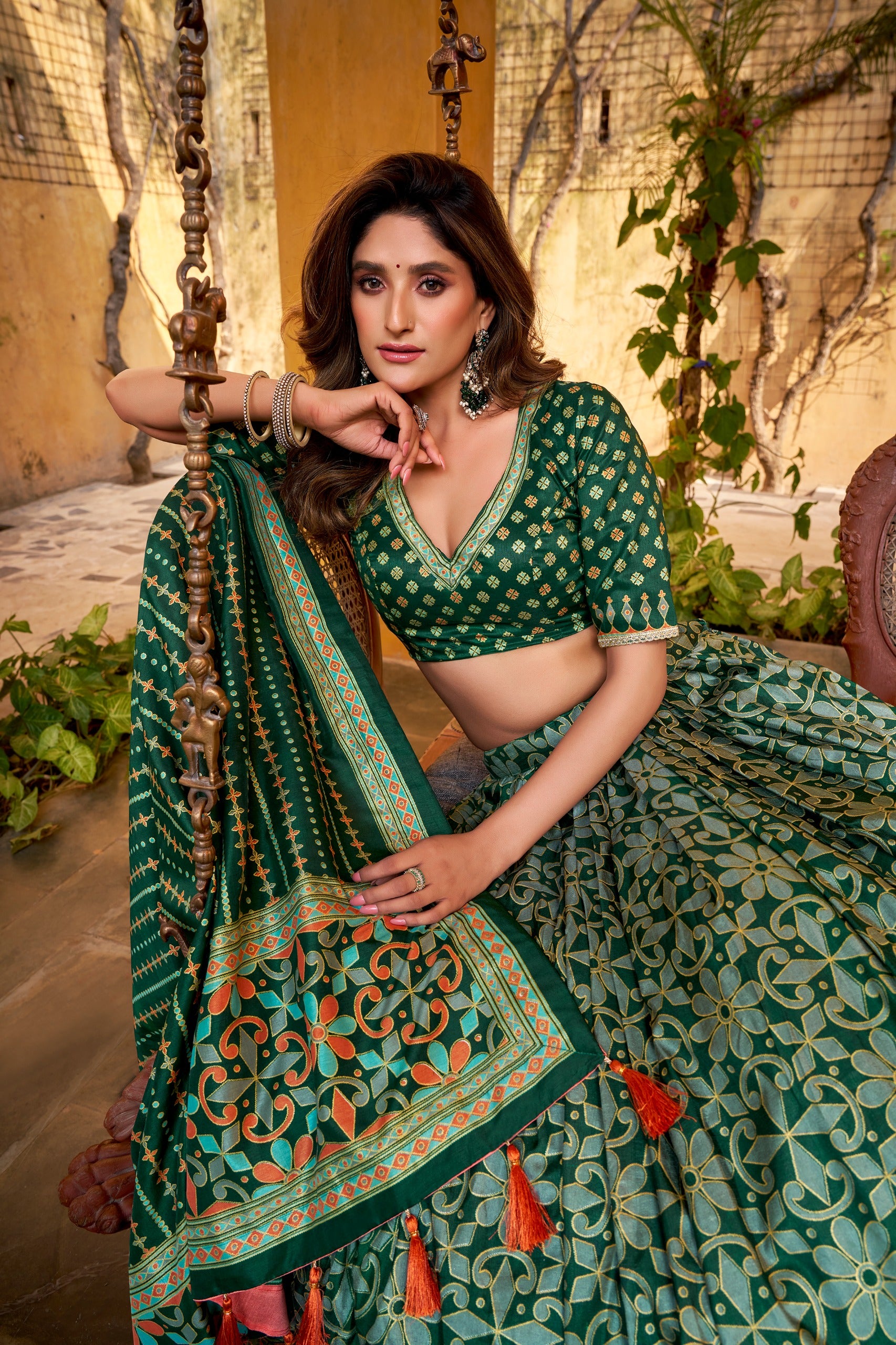 Green Tasar Silk Lehenga Choli with sparkle work, patterned dupatta and decorative tassels