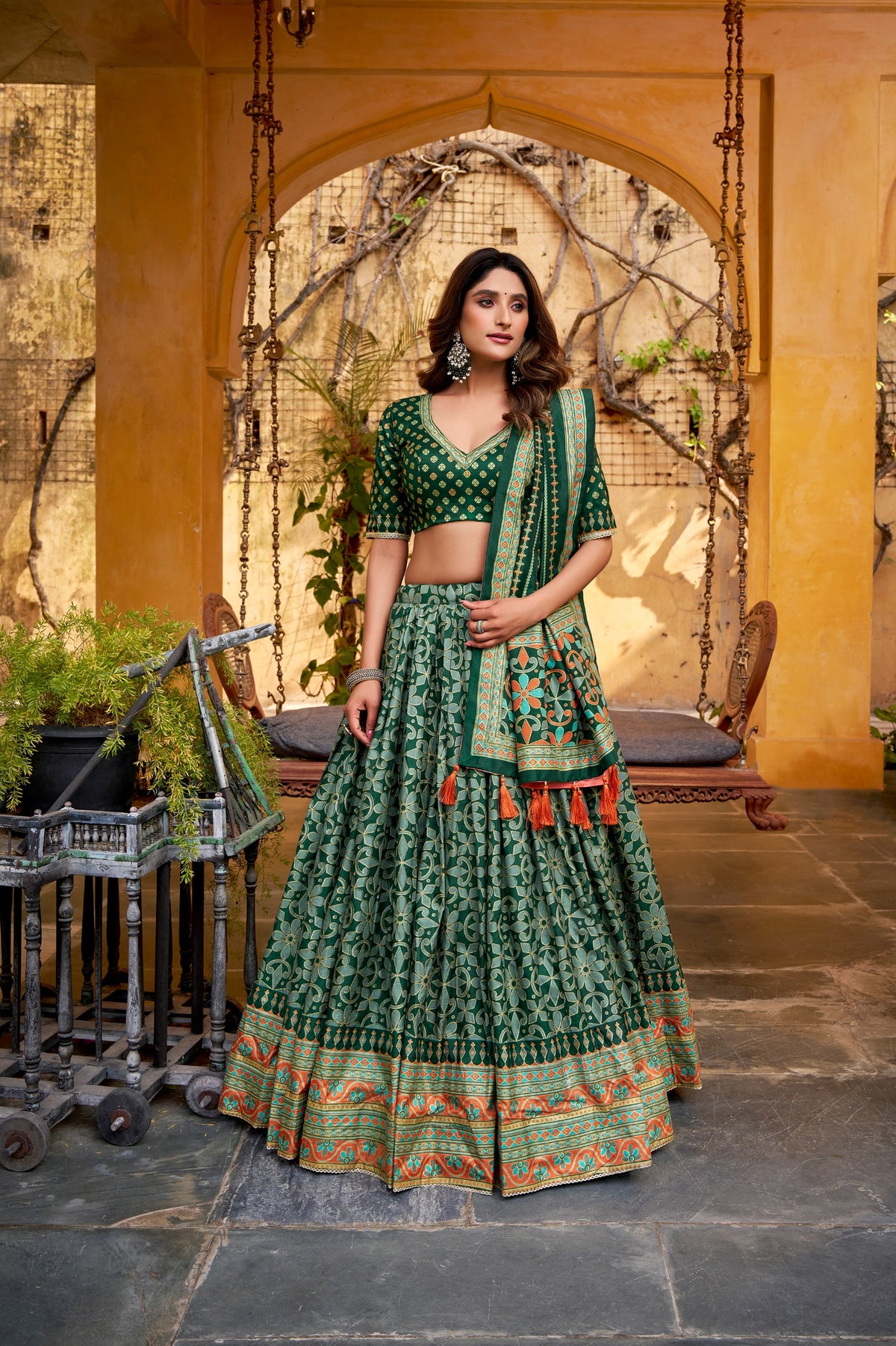 Green Tasar Silk Lehenga Choli full look with flared skirt, sparkle work and tassel dupatta