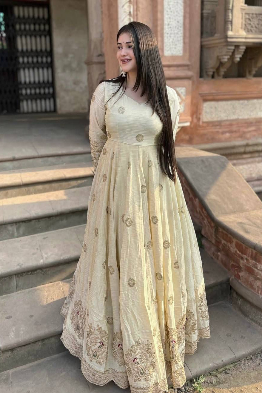 Indian Anarkali dress close view showing Chinon silk texture, embroidered sleeves and detailed hem