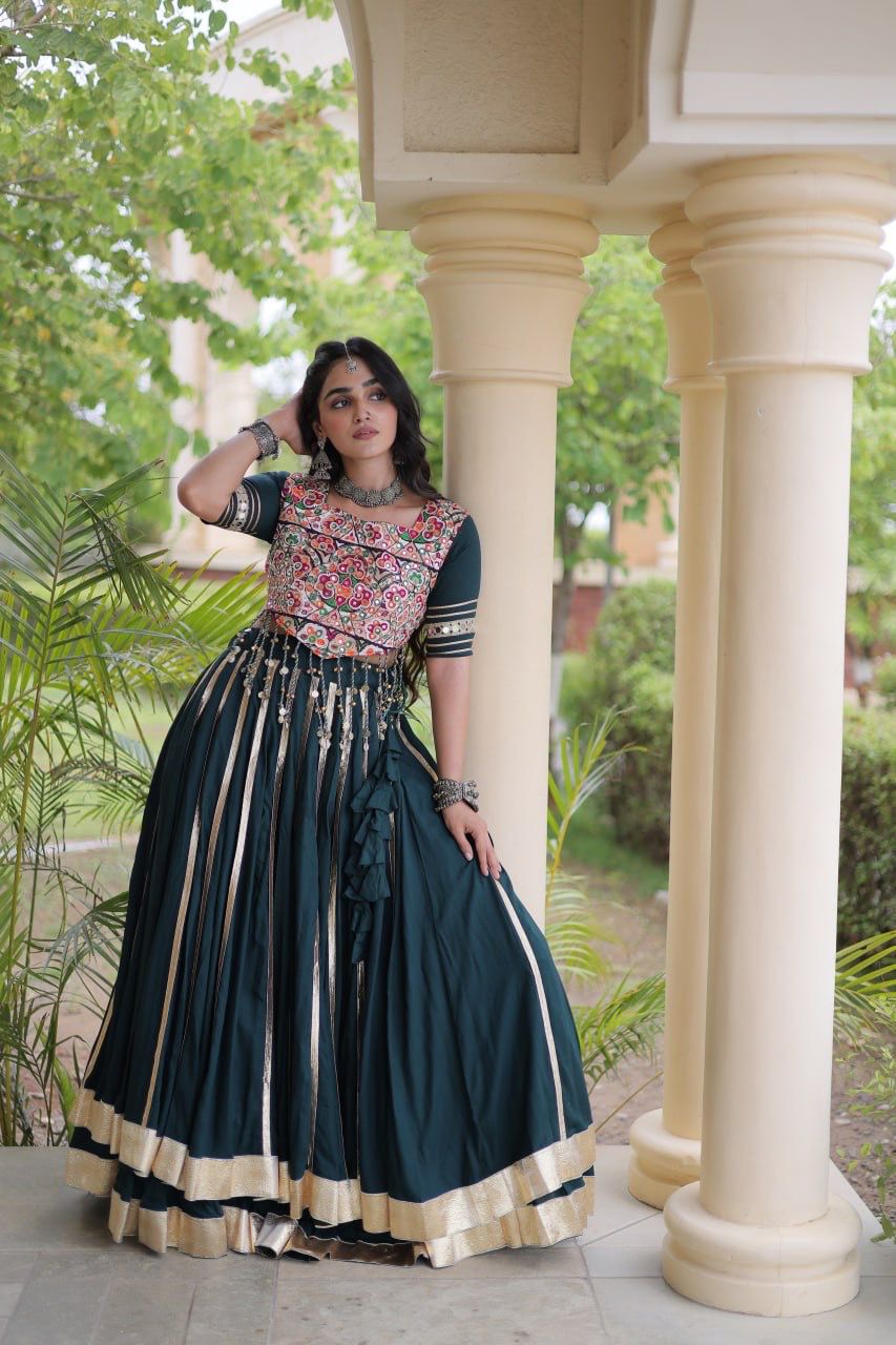 Indian lehenga choli showcasing colourful Gamthi embroidery across the full-stitched blouse