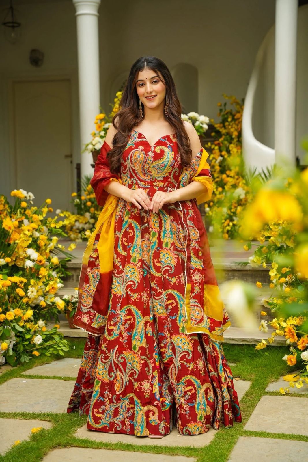 Front view of flared Jimmy organza Anarkali gown in red digital print
