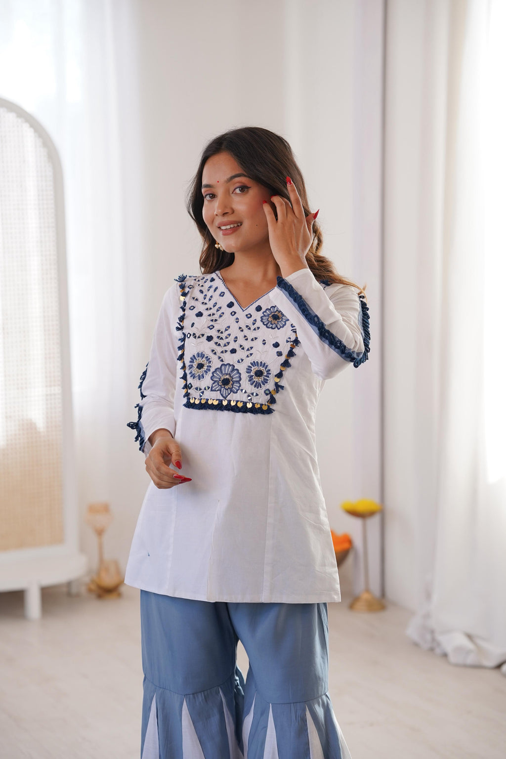 Back view of white and blue Kurta Palazzo Set with detailed sleeve lace trim