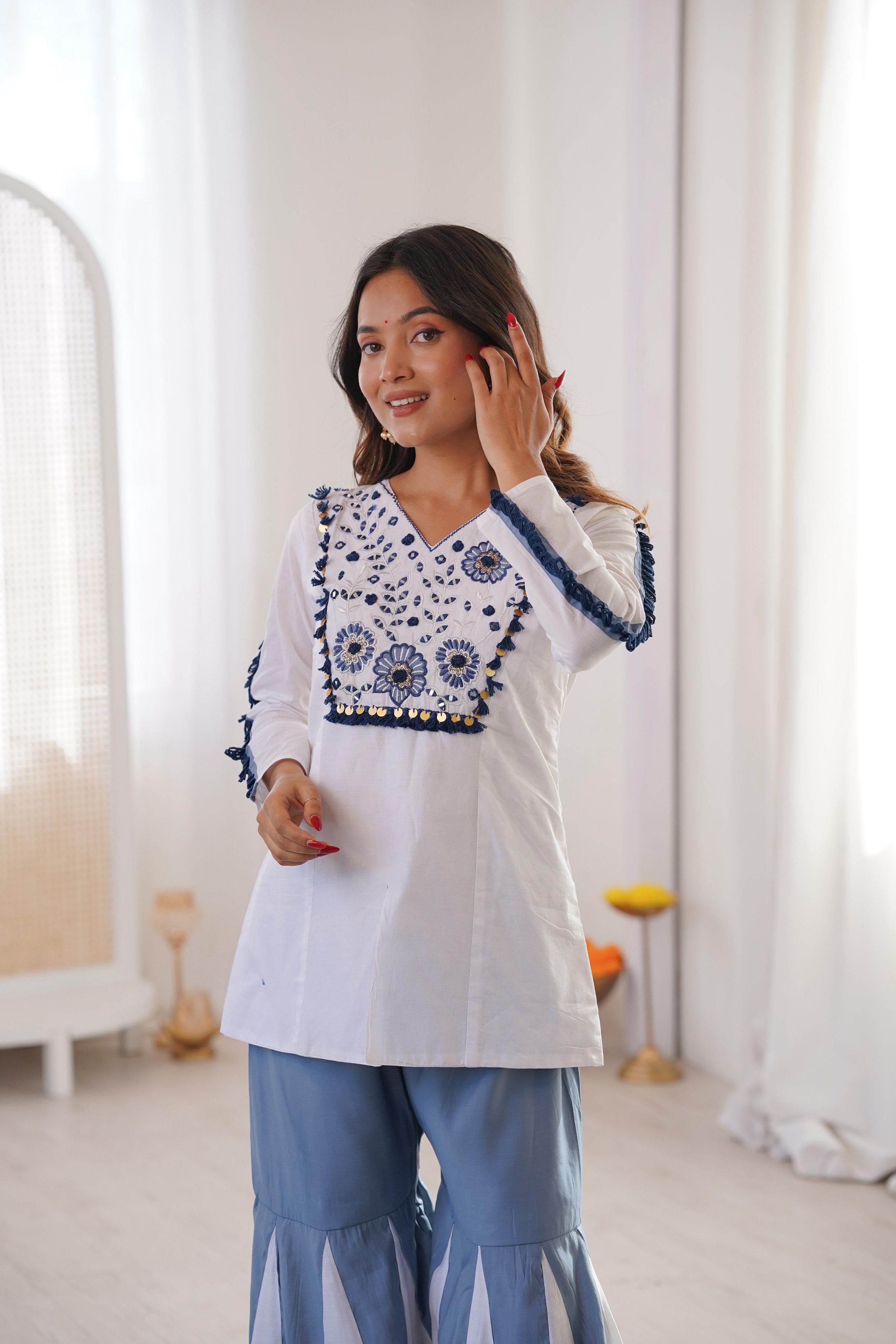 Back view of white and blue Kurta Palazzo Set with detailed sleeve lace trim
