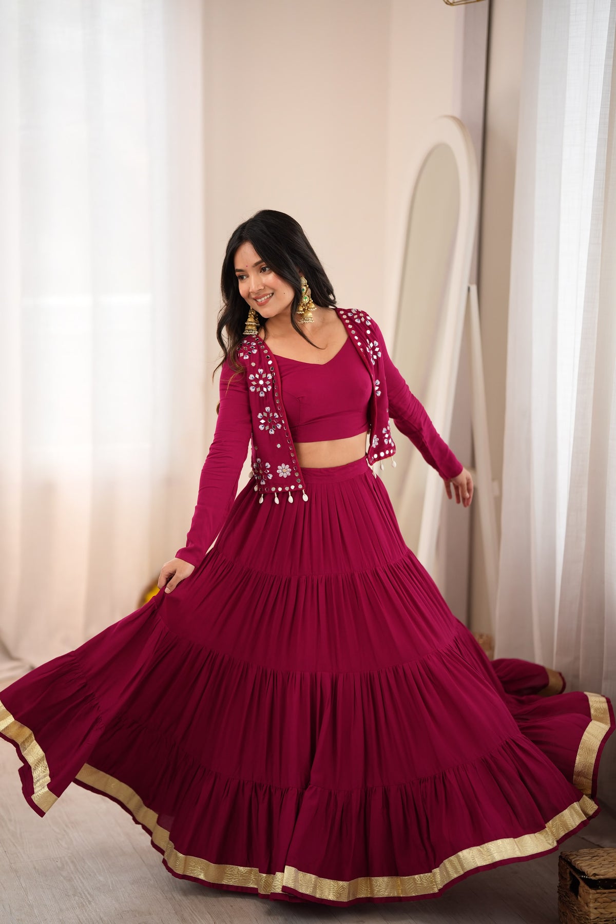 Magenta Gota Patti lehenga choli styled on a model with flowing festive flair
