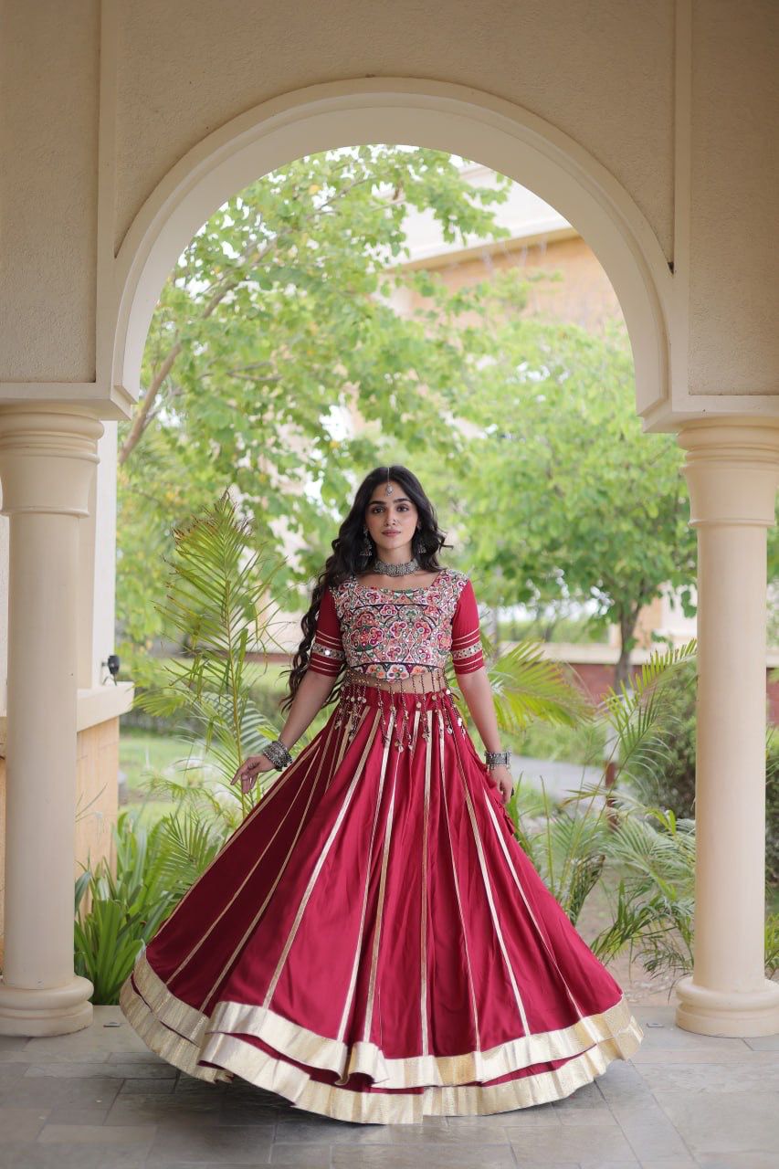 Maroon Indian lehenga choli with gota patti detailing styled for Navratri celebrations