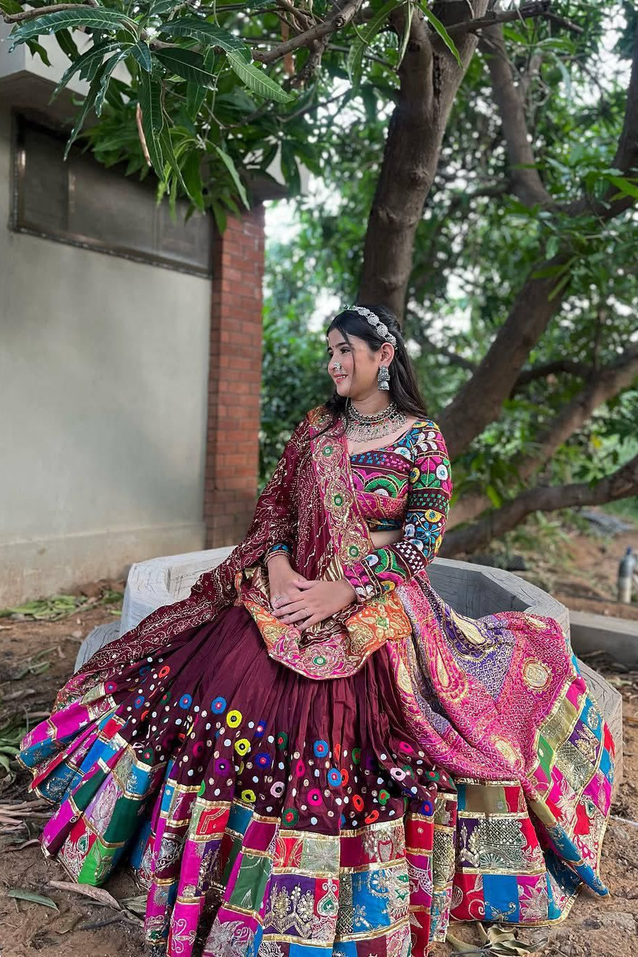 Maroon mirror work Chaniya Choli with colorful printed panels and muslin cotton dupatta