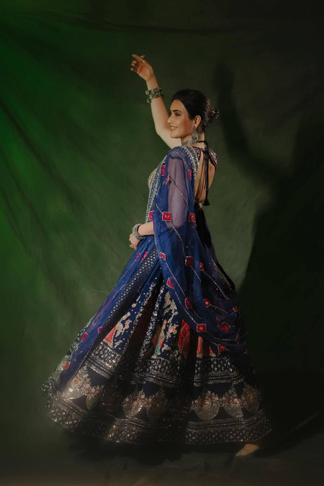 Navy blue Navratri Chaniya Choli back view with detailed dupatta and flared lehenga