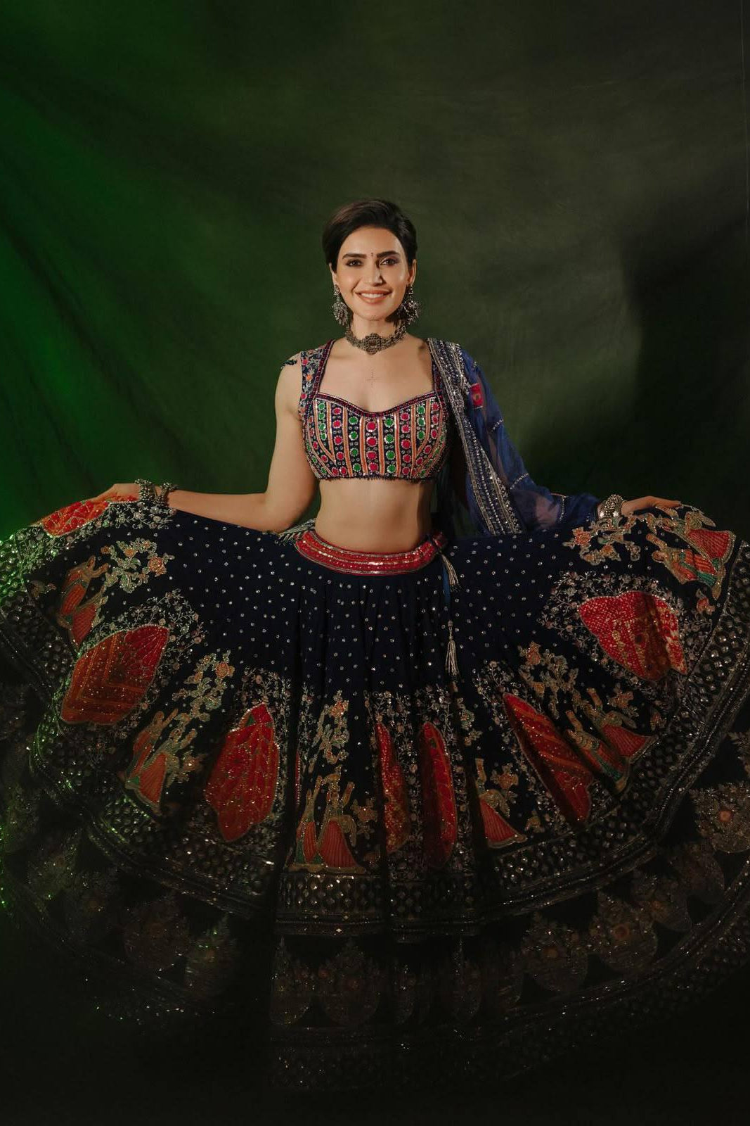 Navratri Chaniya Choli front view showing the wide 4 metre lehenga flair and colourful motifs
