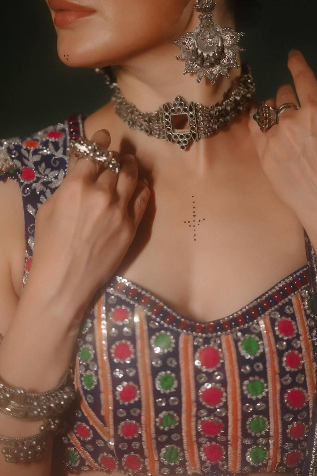 Navy blue Navratri Chaniya Choli close-up showing colourful digital print and real mirror work
