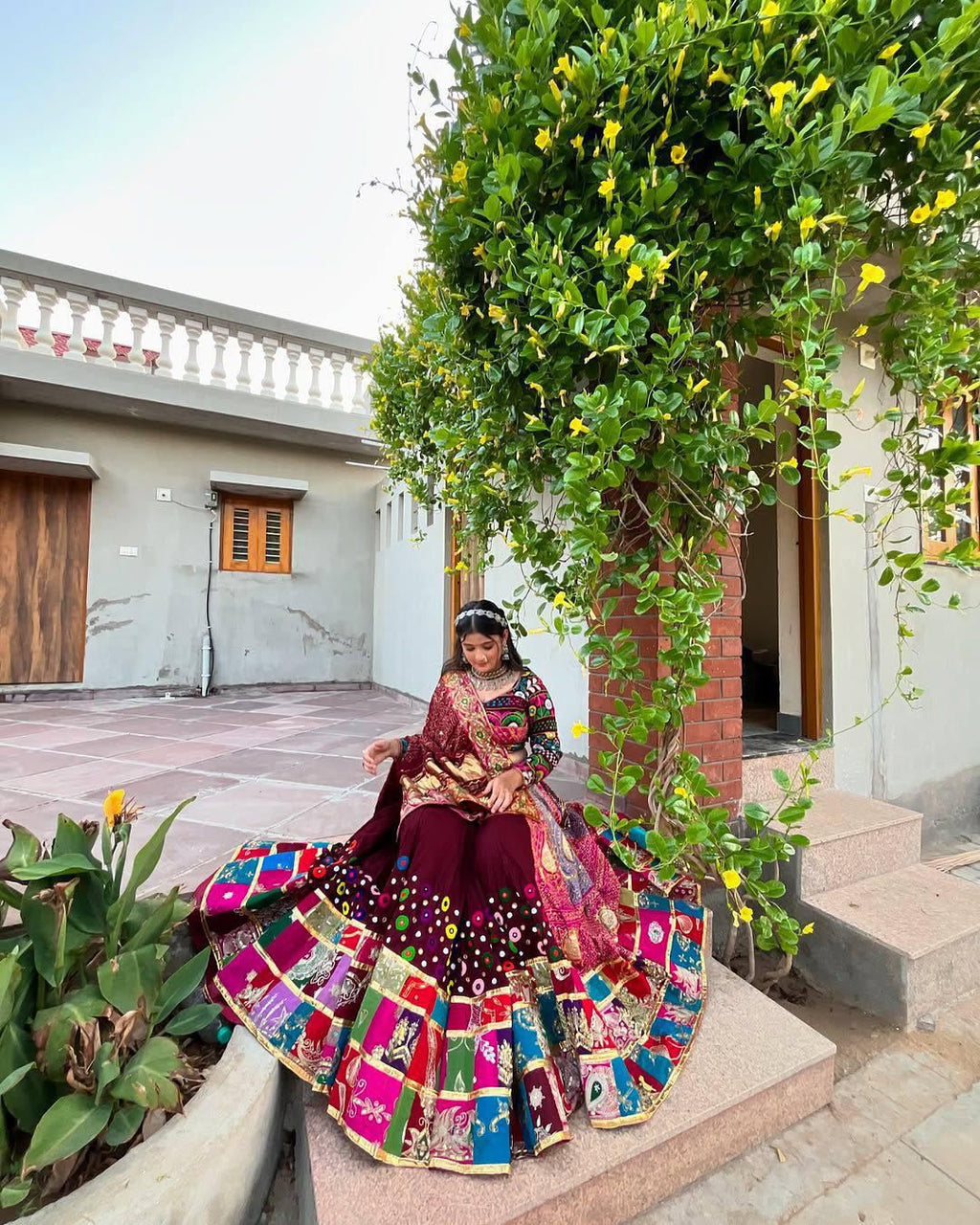 Navratri Chaniya Choli styled outdoors with vibrant printed lehenga and traditional dupatta