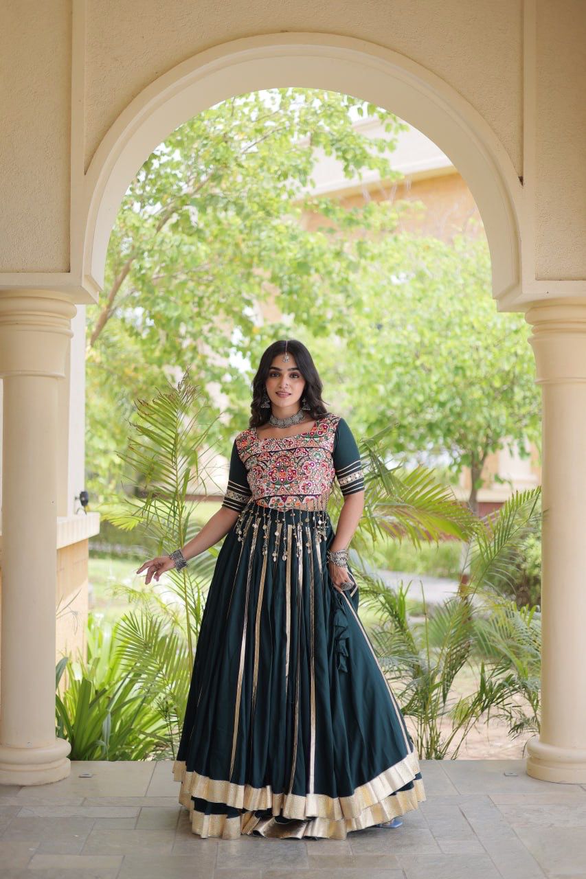 Navratri green Indian lehenga choli styled with traditional jewellery and festive detailing