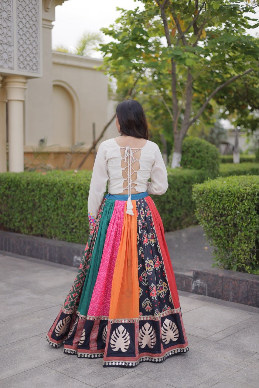 Back view of full-stitched Navratri lehenga choli with detailed blouse design