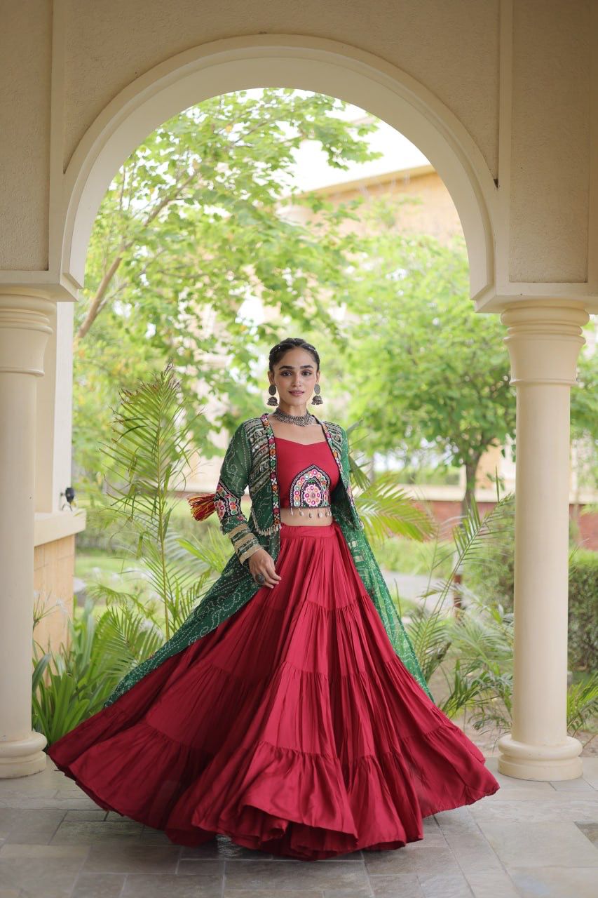 Back view of green Navratri lehenga choli with Kutchi patchwork shrug