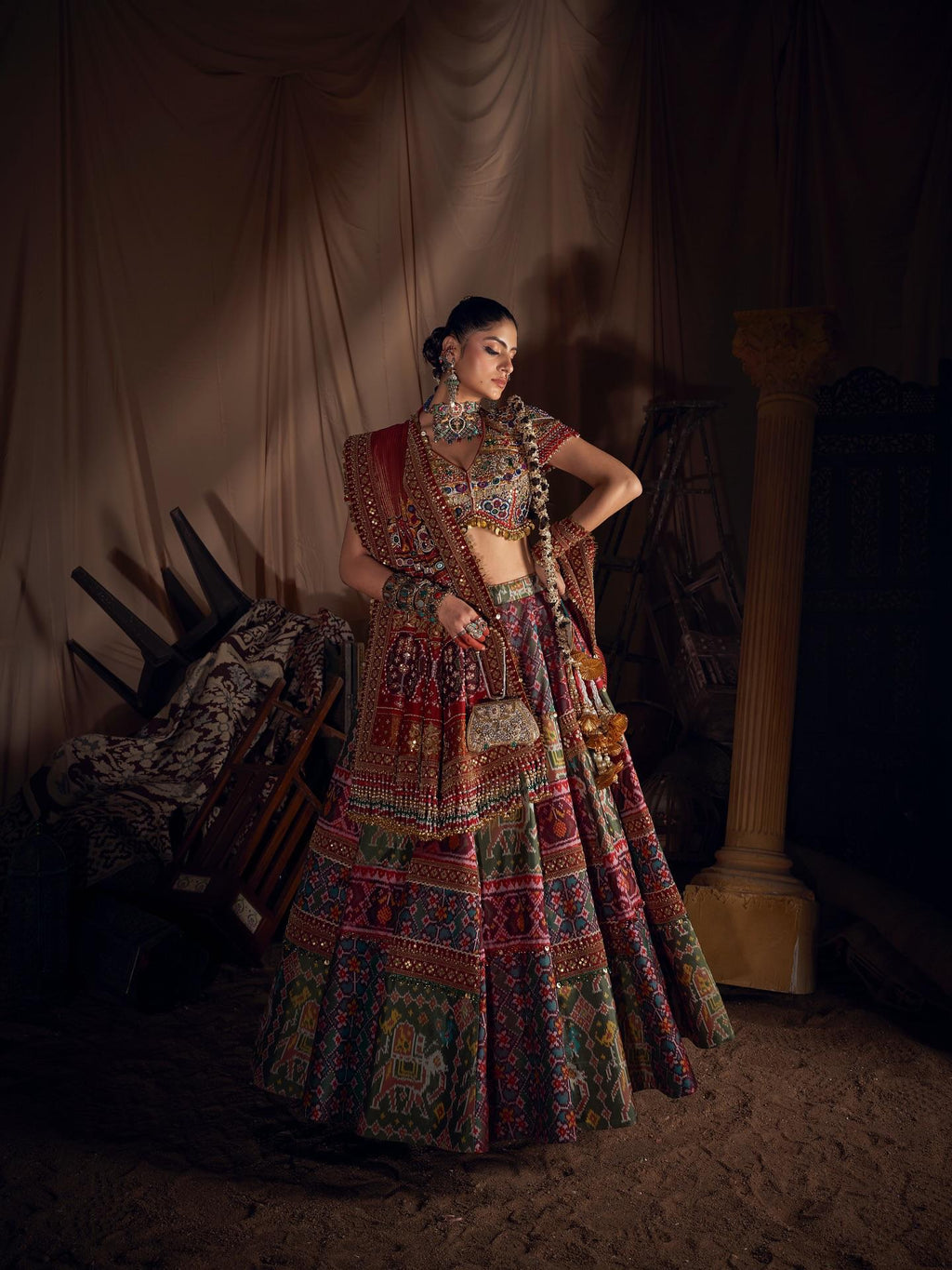 Close-up of Navratri lehenga choli showing colorful print and real mirror work details
