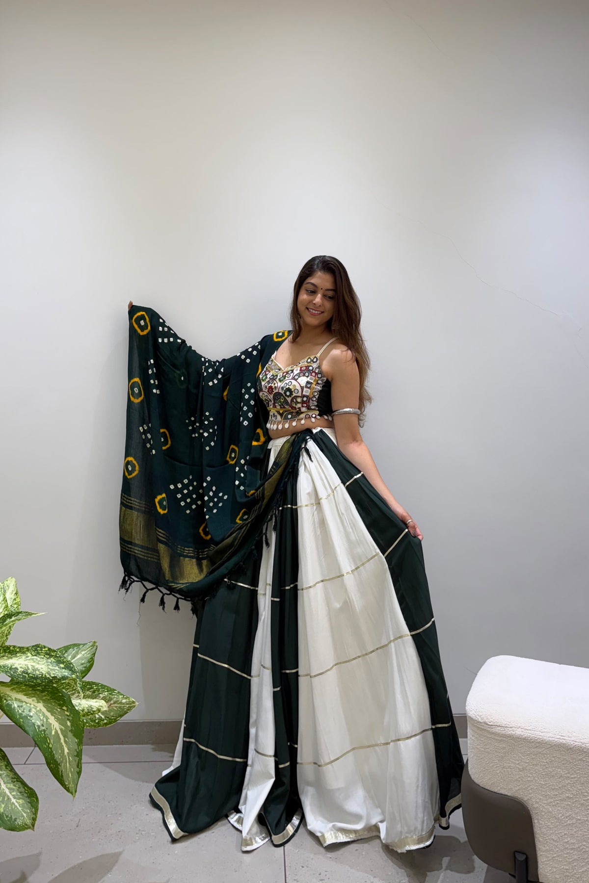 Green and ivory Navratri lehenga choli with mirror embroidered blouse and Bandhni dupatta