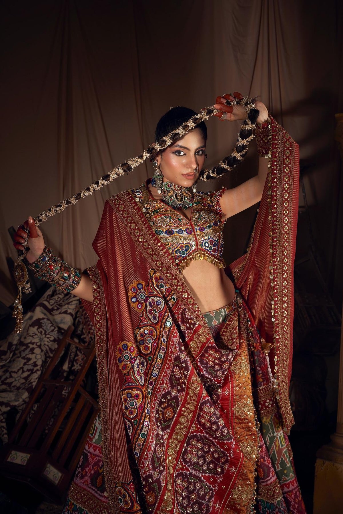 Full-length Indian Navratri lehenga choli styling with colorful printed skirt and dupatta