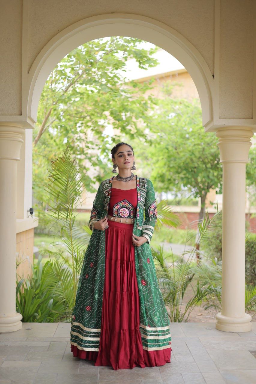 Model wearing green and maroon Navratri lehenga choli for festive celebrations