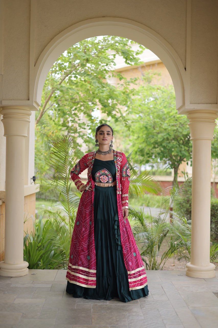 Navratri outfit close-up showing Kutchi patchwork, decorative details and full sleeves