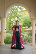 Navratri outfit close-up showing Kutchi patchwork, decorative details and full sleeves