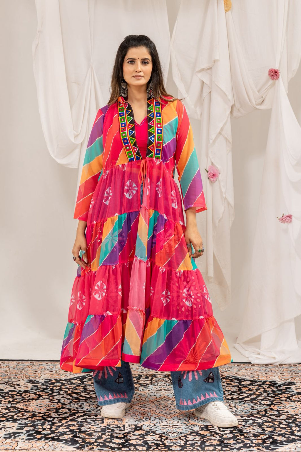 Colorful Navratri shrug set for women styled with mirror-work blouse and denim jeans
