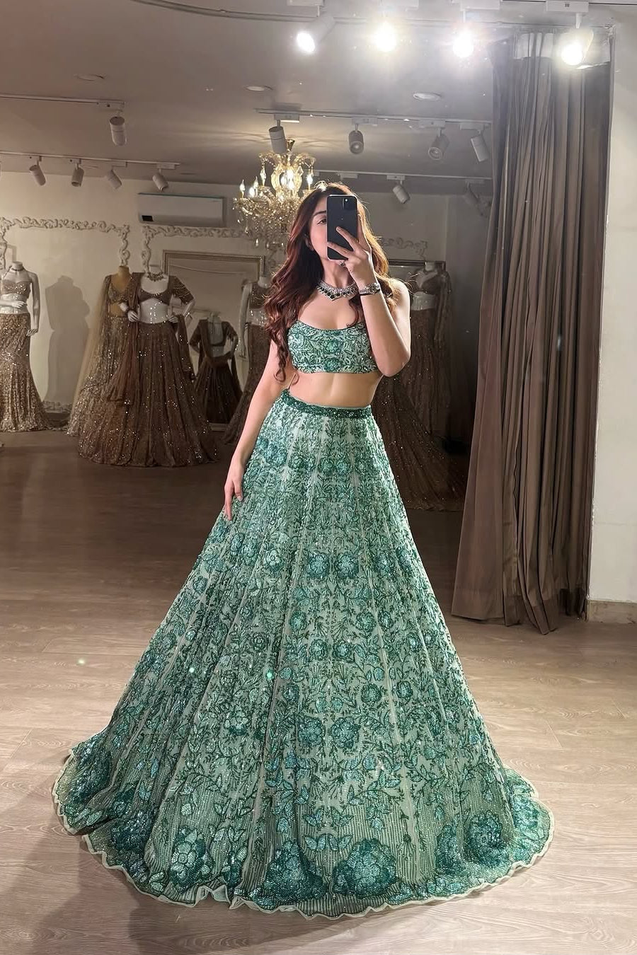 Pastel green georgette lehenga choli showing full 3.5 meter flair and floral work