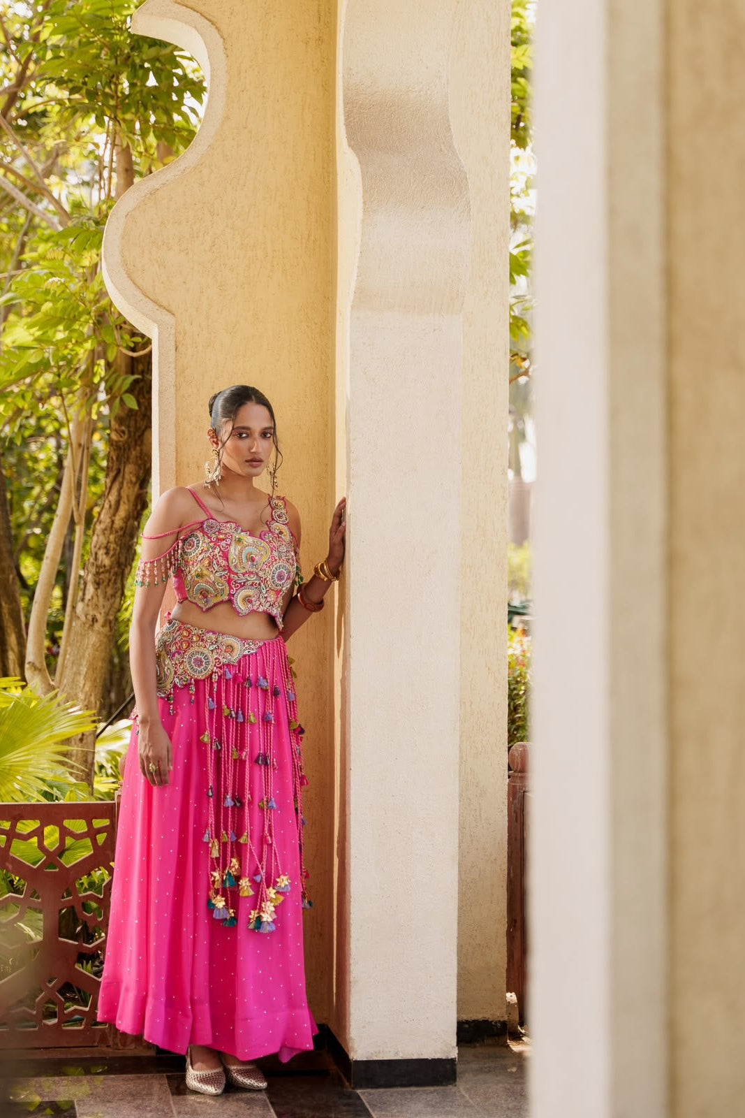 Full view of pink Vichitra Silk lehenga choli with embroidered blouse and flared skirt