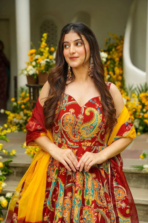 Red digital printed Anarkali gown with colorful paisley motifs and dupatta