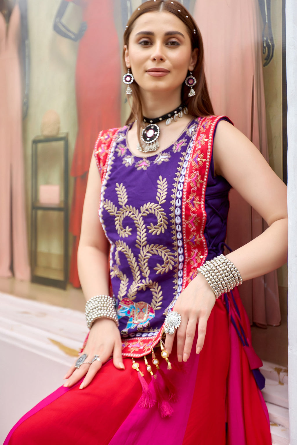 Purple embroidered shrug with thread work, decorative border and fancy latkan