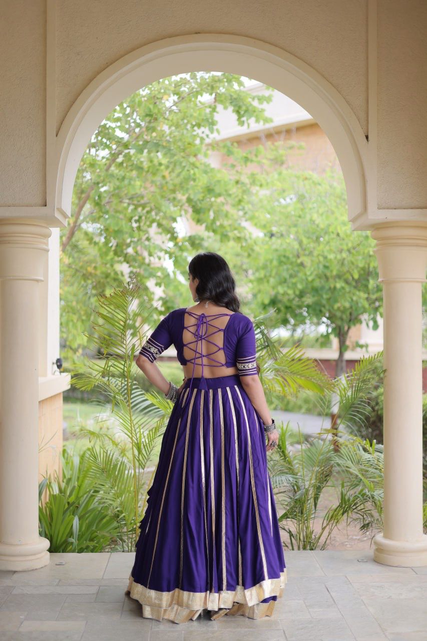 Back view of purple Gamthi lehenga choli with Dori blouse closure and flared skirt