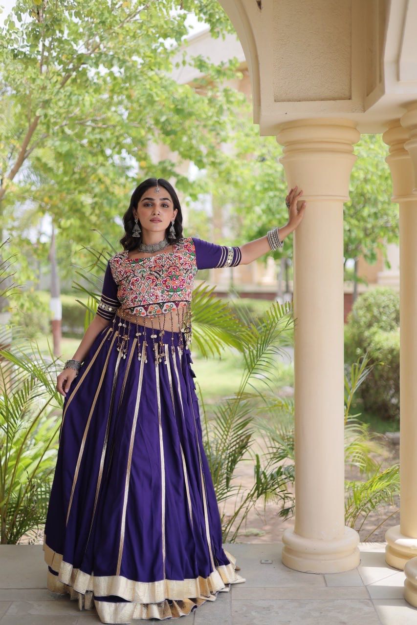 Purple Garba outfit with embellished blouse, mirror work and traditional Gota Patti lace