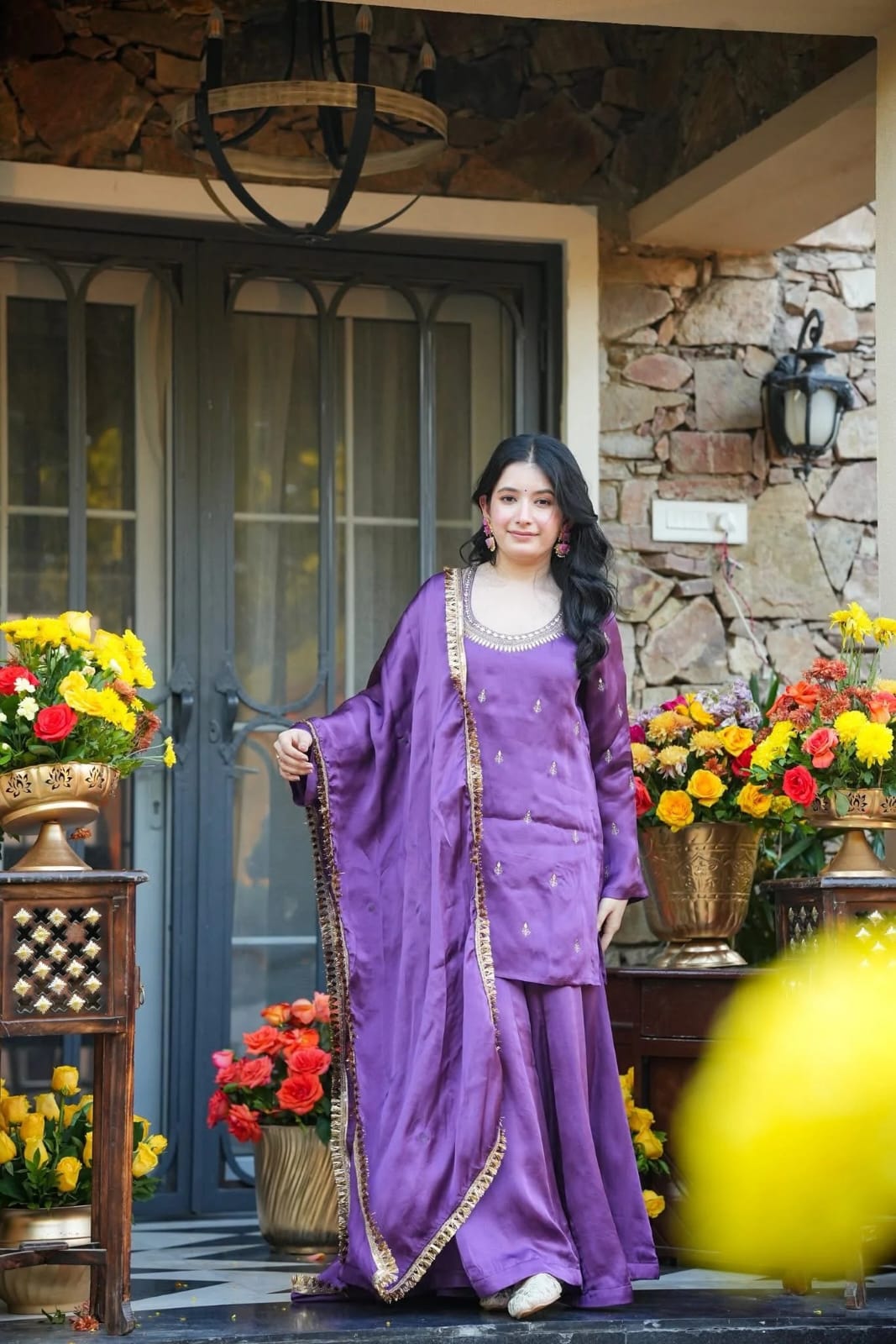Back view of purple party wear kurta showing keyhole detail, embroidery and lace-trimmed dupatta