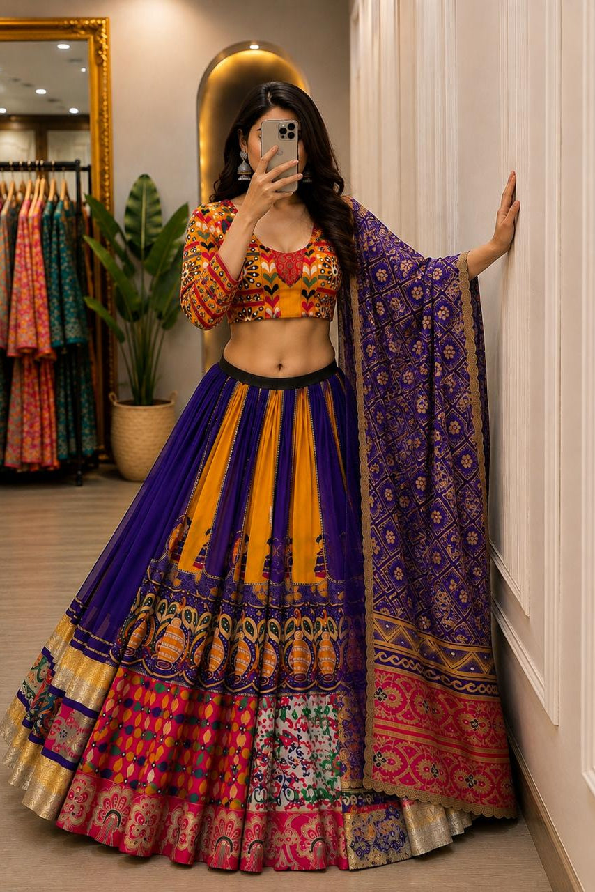 Twirl view of purple and orange chaniya choli showing four meter lehenga flare and printed borders