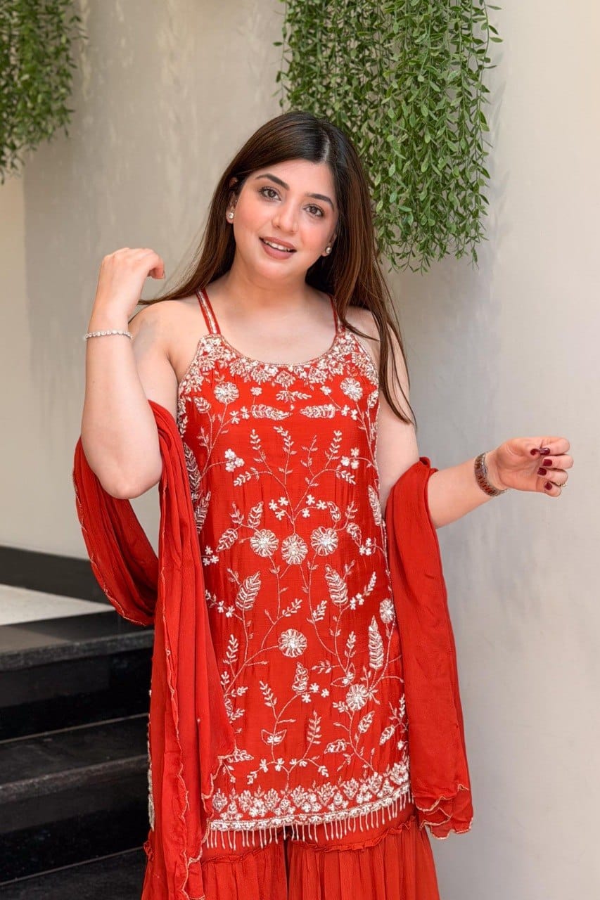 Front view of red Chinon palazzo suit with detailed floral embroidery