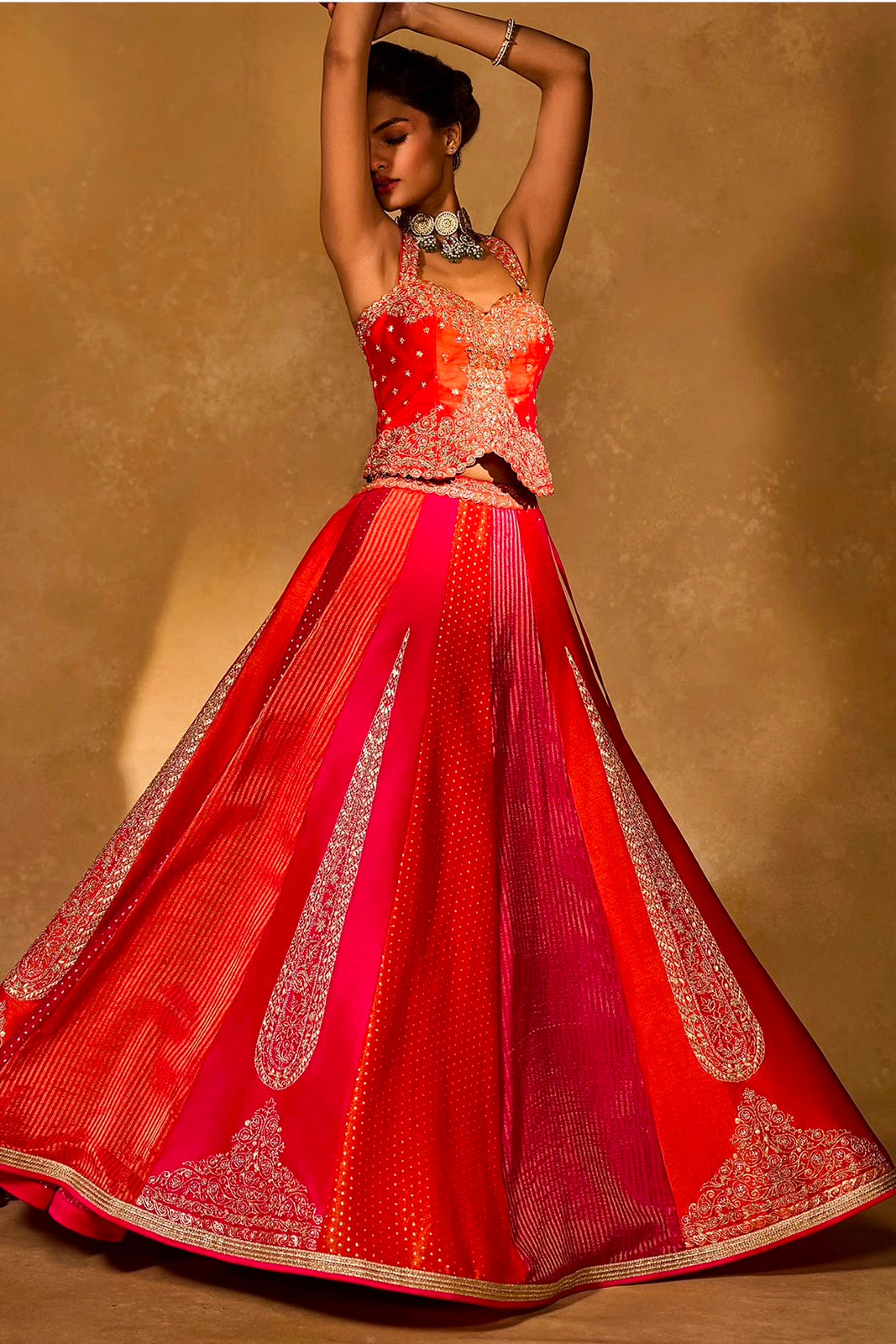 Full-length red pink Chinon silk lehenga choli showing the wide 4-meter flare and ornate hem details