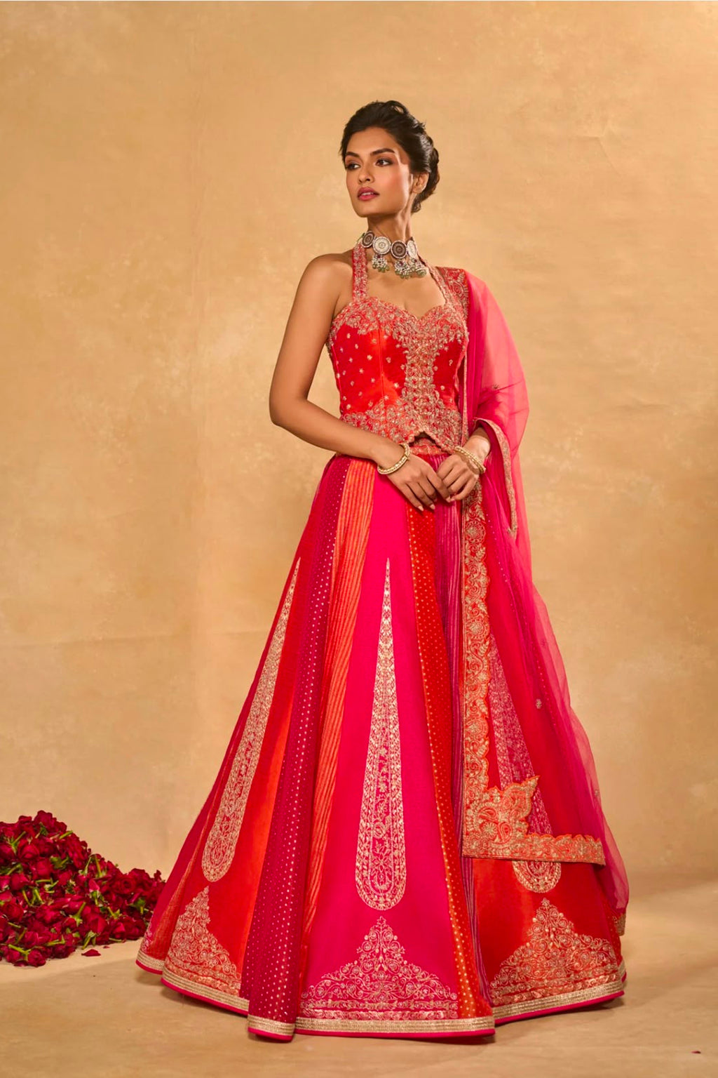 Red pink Chinon silk lehenga choli with embroidered blouse, patterned panels and butterfly net dupatta