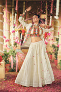 Traditional cotton lehenga choli set with embroidered koti and flowing 7-meter ruffle flair